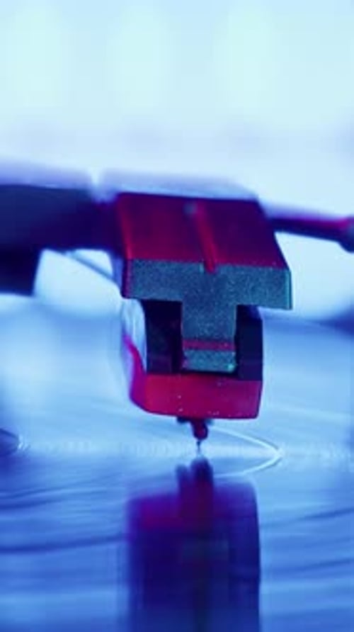 Record Player Stylus Playing Vinyl Record in Close Up