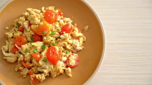 Stir-fried tomatoes with egg or Scrambled eggs with tomatoes - healthy food style