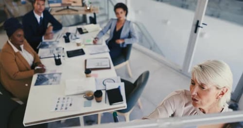Woman, office and writing for strategy, planning or teamwork in boardroom from high angle