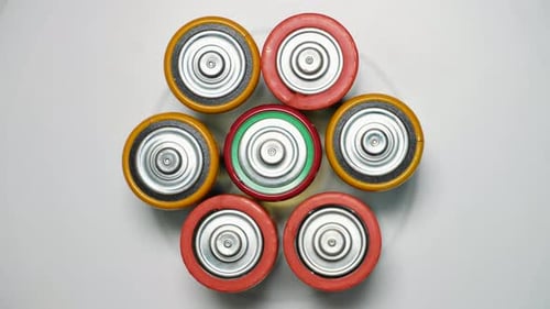 Old Used Batteries Type D Rotate in a Circle