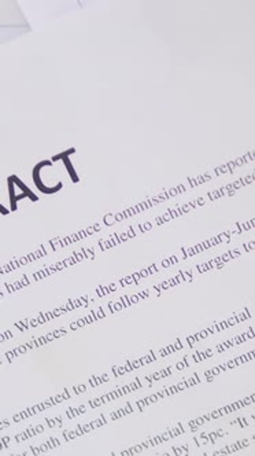 Top View of Contract Document, Vertical Video