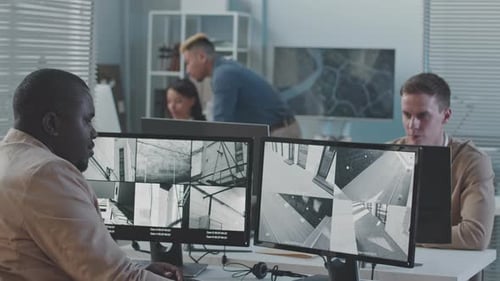 Security Team Monitoring Real Time Surveillance Footage