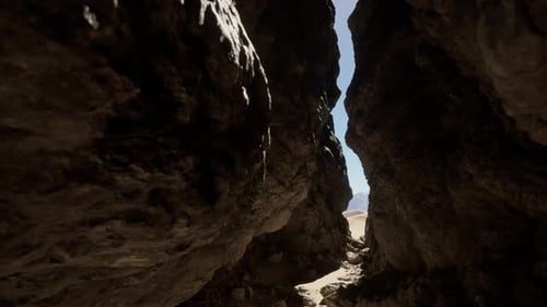 A Narrow Path Between Two Large Rocks