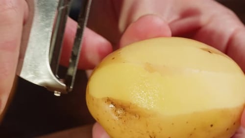 Peeling Potato with Peeler