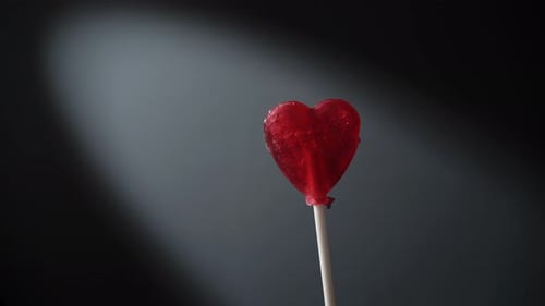 Close Up of a Red Heart Lollipop