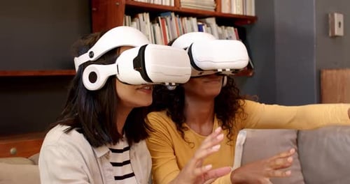 Friends Enjoying Virtual Reality Experience at Home