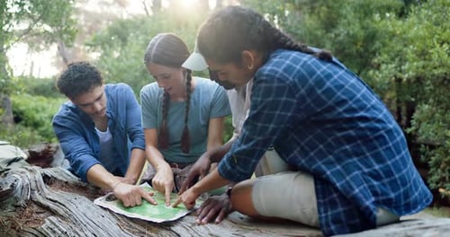 Group, friends or map in woods for hiking, travel planning or pointing in direction