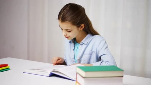 Education, People, Children And Learning Concept - Happy School Girl Reading Book Or Textbook At ...