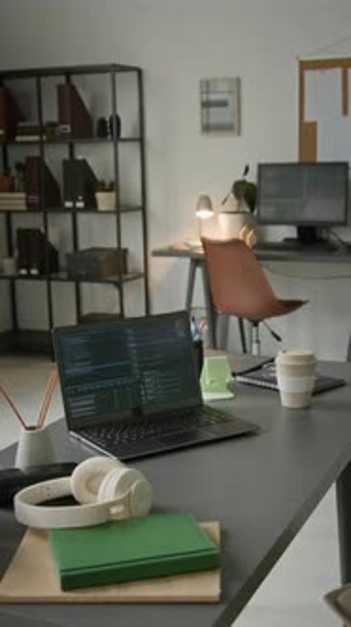 Desk of Software Engineer with Code Testing Agent Working