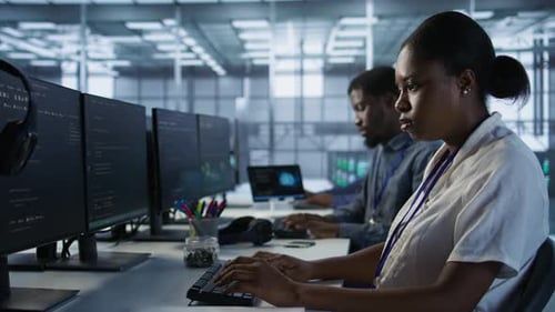 Close Up of Programmer in Data Center Implementing AI Systems