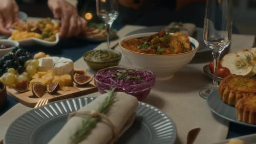 Beautiful Table Setting with Food and Drink