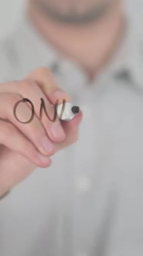 Online Banking Written on Glass by Man in Studio