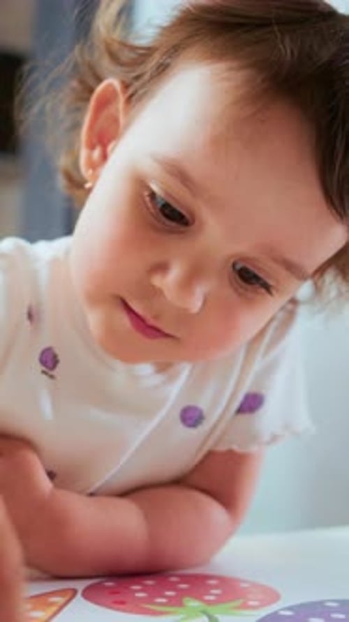 Young Child Watches Clay Activity Attentively Innocent Toddler Observes Clay Craft Calmly