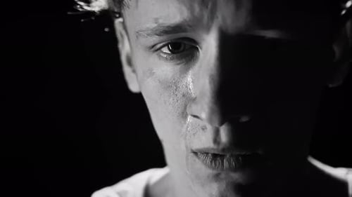 Monochrome Portrait of Crying Young Man