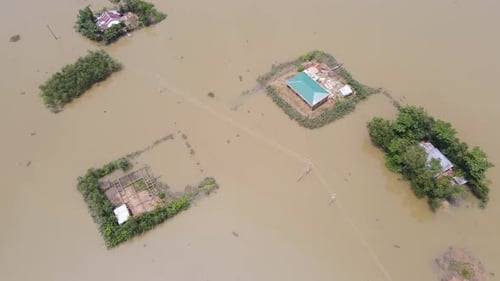 Bird’s-eye view of flood disaster with submerged homes and surrounding land at a village in Banglade