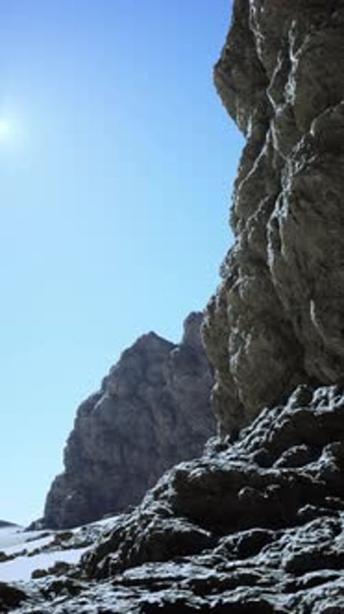 Majestic Desert Rock Formation Under Blue Sky