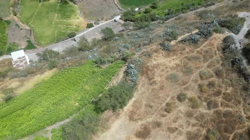 Aerial panning birdseye shot of the beautiful mountain landscape of matacuna lima in peru with wide