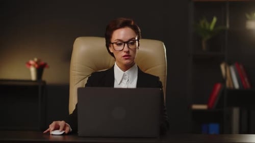 The Business Woman Sending Emails for Partners and Colleagues Using Laptop in Office Business Lady
