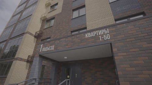 Highrise Building with Balconies in Calm Residential Area