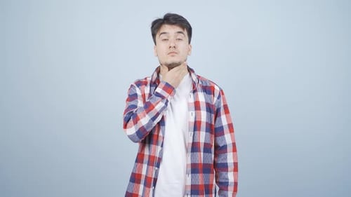 Man Experiencing Sore Throat Pain and Discomfort