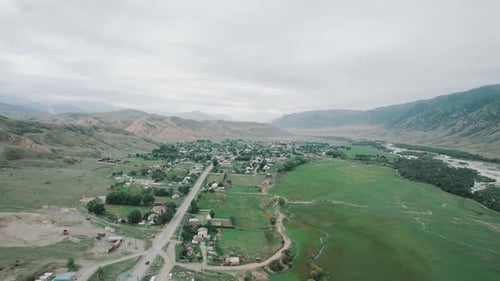 Village in the Mountains Rural Landscape in the Valley of River
