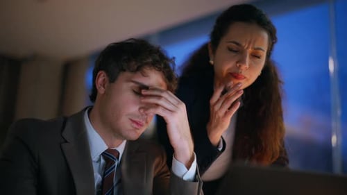 Professional Trainer Teaching Intern Dissatisfied Work in Evening Office Closeup