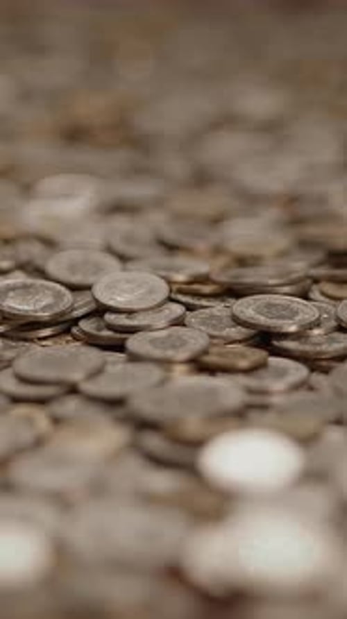 Shiny Coins Piled in Abstract Still Life