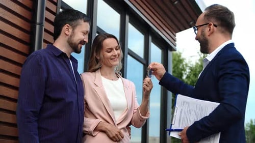 Male Real Estate Agent Seller Giving Keys Happy Couple Family Buying Countryside House Success Deal