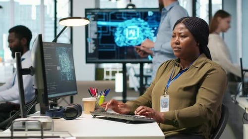 Female Software Developer Using Artificial Intelligence to Optimize Performance