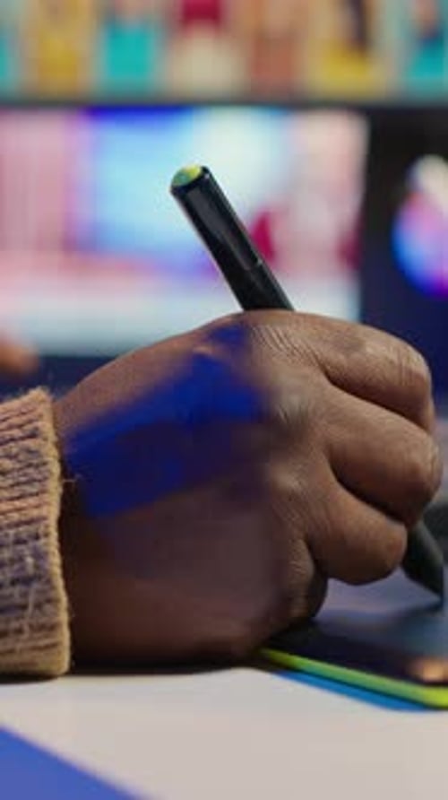 Hand Using Graphics Tablet for Photo Editing