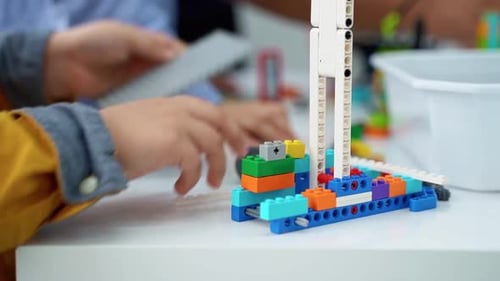 Robotics Programming Class Children Construct and Code Robot STEM Education Using Constructor