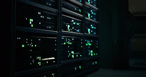 Data Center with Illuminated Server Racks at Nighttime