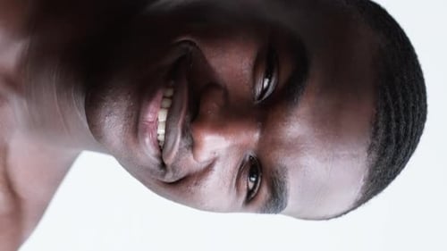 Man Smiling in Close Up Portrait