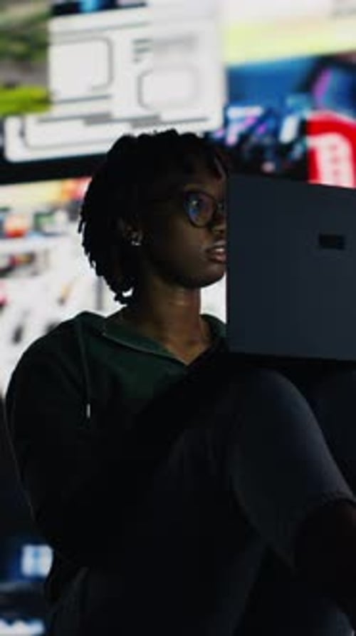 Vertical Video Teenager Procrastinating Online Browsing Websites on Laptop