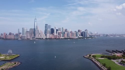 New York City skyline during the day with a view of the hudson river.