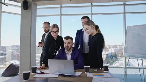 Collaboration and teamwork in the office atmosphere.