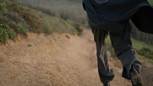 Woman Legs Running Path in Black Boots Close Up