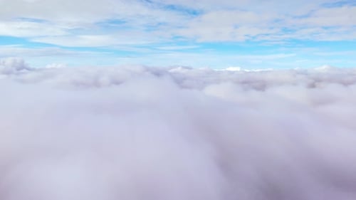 Aerial view morning scenery Mist flowing over the high mountains.