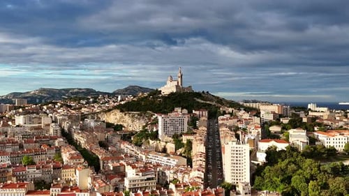 Aerial Shot of the City of Marseille France at Sunrise NotreDame De La Garde
