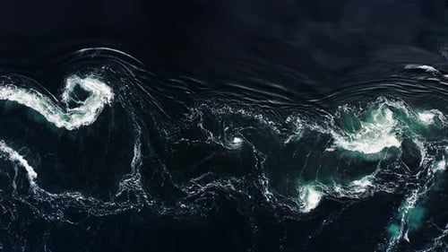 Waves of Water of the River and the Sea Meet Each Other During High Tide and Low Tide