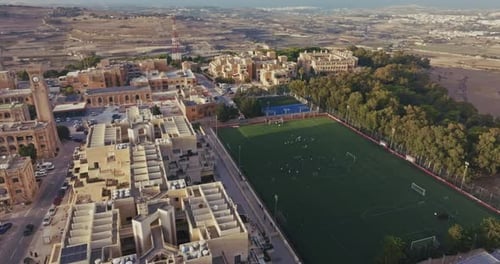 Football Stadium in the Urban Landscape of a City in Malta Aerial View