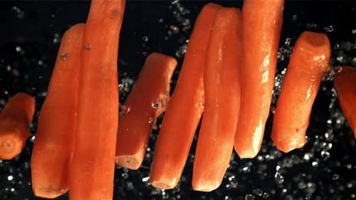 Carrots with Water Drops Filmed is Slow Motion 1000 Fps