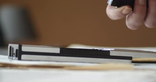 Insérer la cassette dans le compartiment d'un lecteur portable