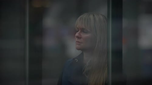 Sad Blond Woman Worried Thinking About Life Problems at Trainstation