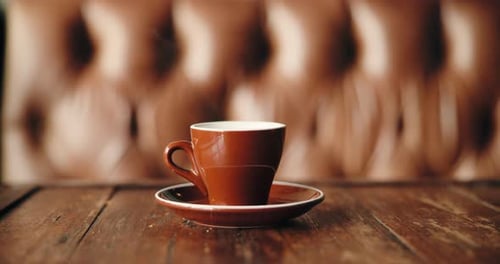 Coffee, cafe and mug on table with drink for hospitality, caffeine and espresso in small business