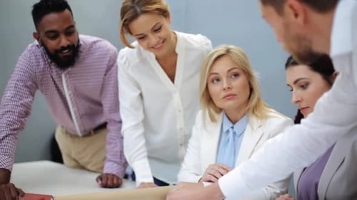 Building, Construction, Architecture, Real Estate And People Concept - Business Team With Bluepri...