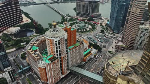 An aerial view of a city with tall buildings