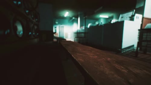 Cinematic Slow Tracking Shot in a Dark Industrial Interior