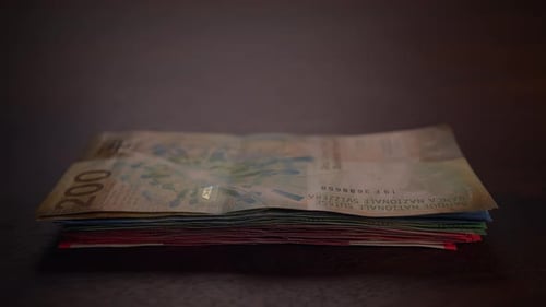 Close Up Dolly Shot Showing Many Different Swiss Franc Banknotes Cash Money Counting Swiss Francs