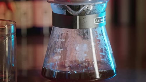 Steaming Black Coffee in Glass Coffee Pot